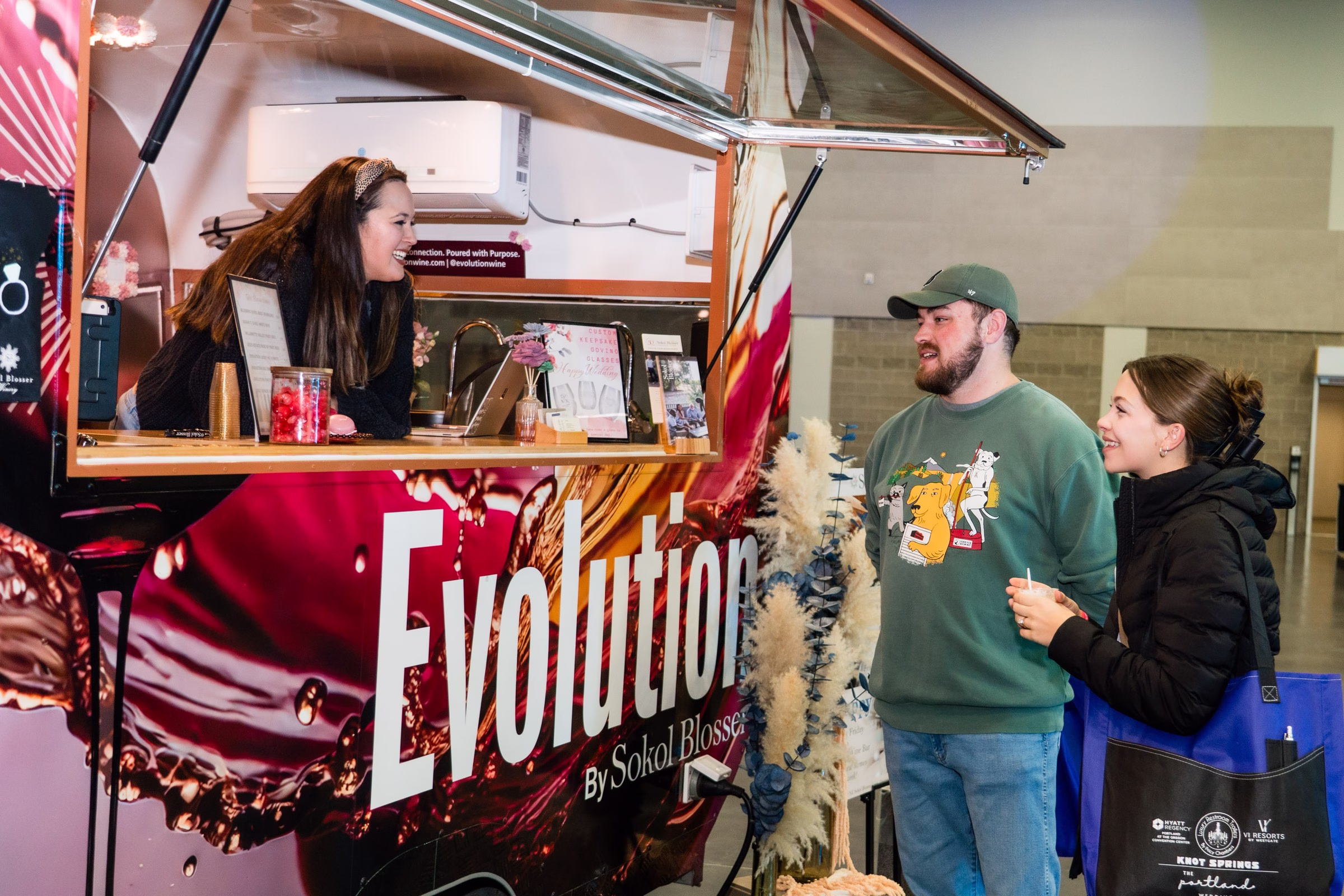 Evolution by Sokol Blossom food truck serving customers at The Portland Wedding Show 2026 bridal expo